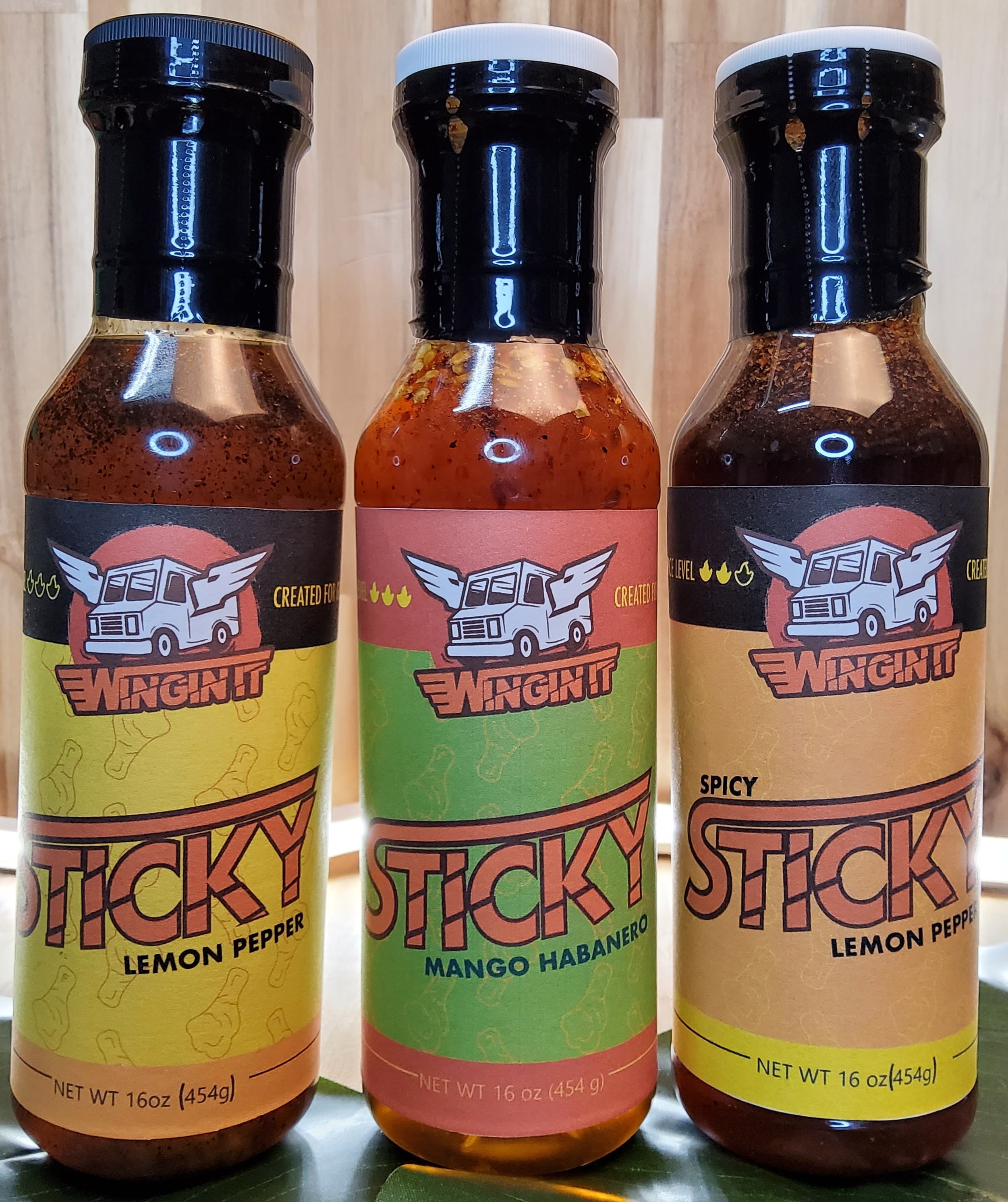 Sticky Lemon Pepper, Mango Habanero Wing Sauce